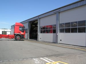 multiple gray industrial door with windows