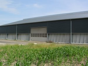 wide gray industrial door with windows